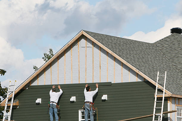 Professional Vinyl Siding technician working in Ashley, OH